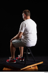 Whole Body Man White Sports Shirt Shorts Chubby Sitting Studio photo references